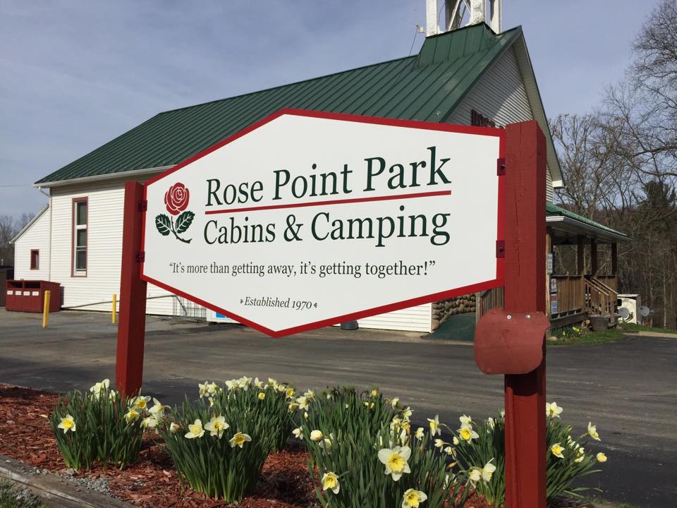 Rose Point Park Cabins and Camping sign